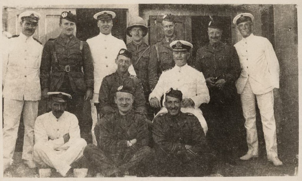 Officers of the 1/7th Scottish Rifles pose with the crew on board SS Empress of Britain
